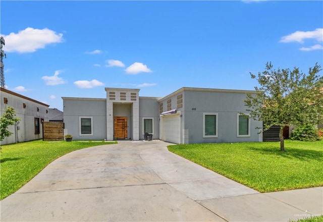 contemporary house featuring a front yard