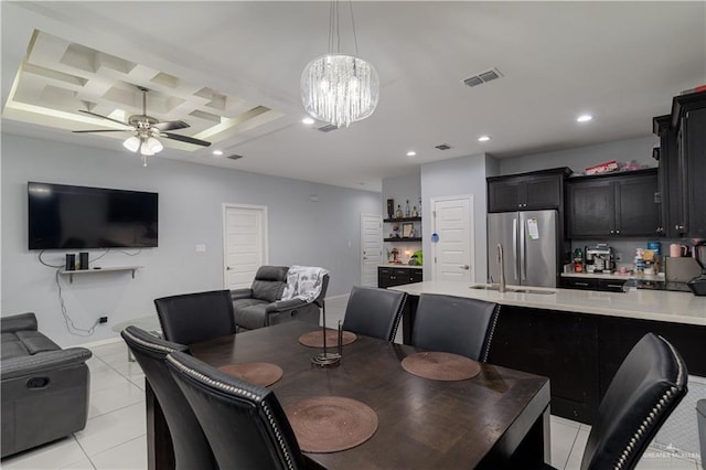 3525 Rancho Del Rey St, Edinburg, TX 78542 - dining area with ceiling fan with notable chandelier, visible vents, recessed lighting, light tile patterned flooring, and coffered ceiling