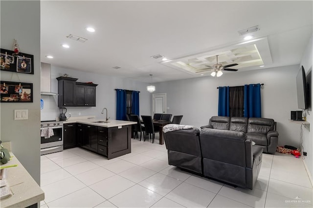 3525 Rancho Del Rey St, Edinburg, TX 78542 - living area featuring light tile patterned floors, a ceiling fan, visible vents, recessed lighting, and a raised ceiling