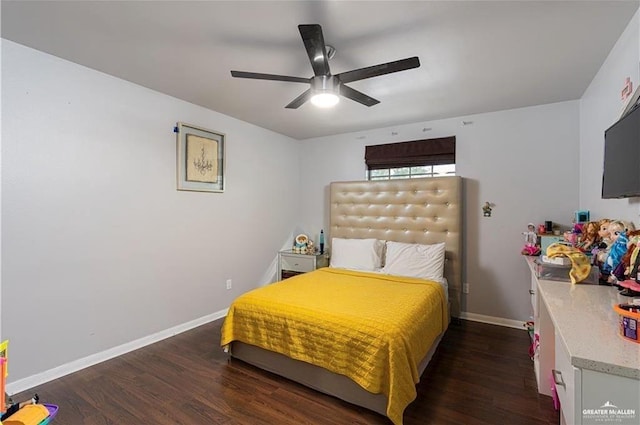 bedroom featuring ceiling fan and dark hardwood / wood-style flooring