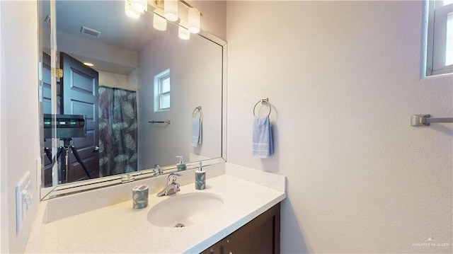 1208 E Camellia Ave Unit 2, Mcallen, TX 78501 - bathroom with vanity and visible vents