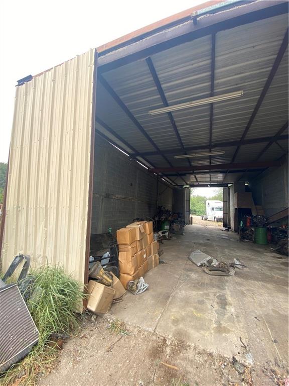 garage with a carport