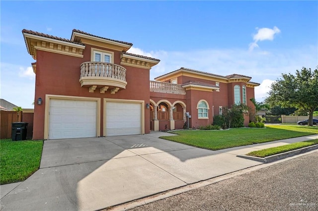 mediterranean / spanish home featuring a garage, a balcony, and a front yard