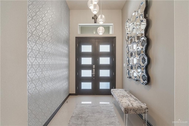 tiled entrance foyer with french doors