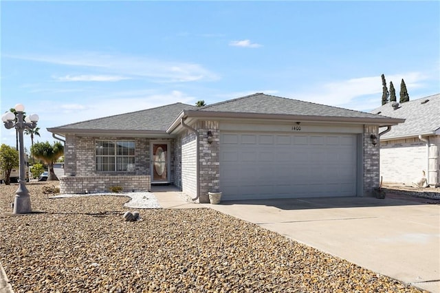 single story home featuring a garage