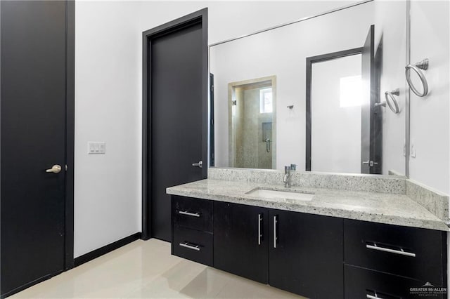 bathroom featuring vanity and walk in shower