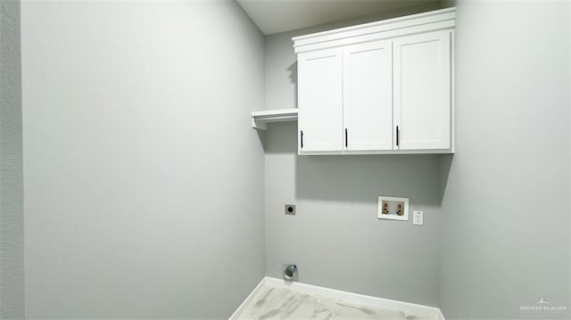 washroom featuring washer hookup, hookup for an electric dryer, and cabinets