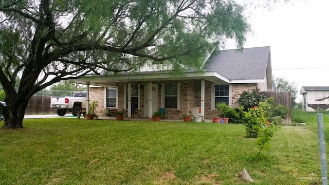 view of front of home with a front lawn