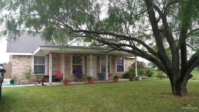 ranch-style home with a front lawn