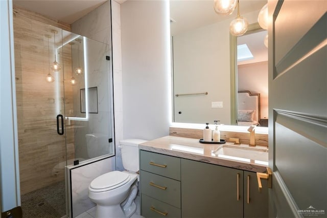 2511 Wisteria St, Mission, TX 78574 - full bath with toilet, vanity, a stall shower, and ensuite bath