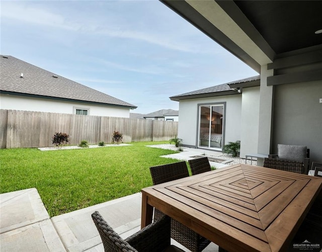 2511 Wisteria St, Mission, TX 78574 - view of yard with a patio and outdoor dining area