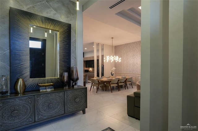 2511 Wisteria St, Mission, TX 78574 - hall with a chandelier and marble finish flooring