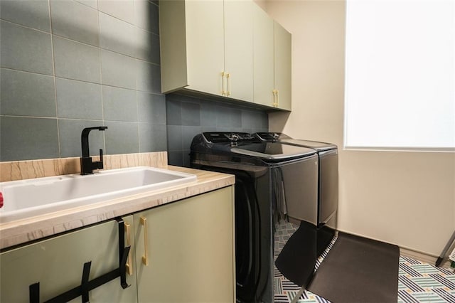 2511 Wisteria St, Mission, TX 78574 - laundry room featuring cabinet space and washing machine and clothes dryer