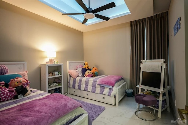 2511 Wisteria St, Mission, TX 78574 - bedroom featuring marble look tile flooring and a ceiling fan