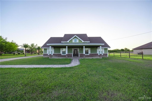 view of front of house with a front lawn