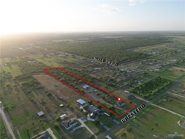 birds eye view of property featuring a rural view