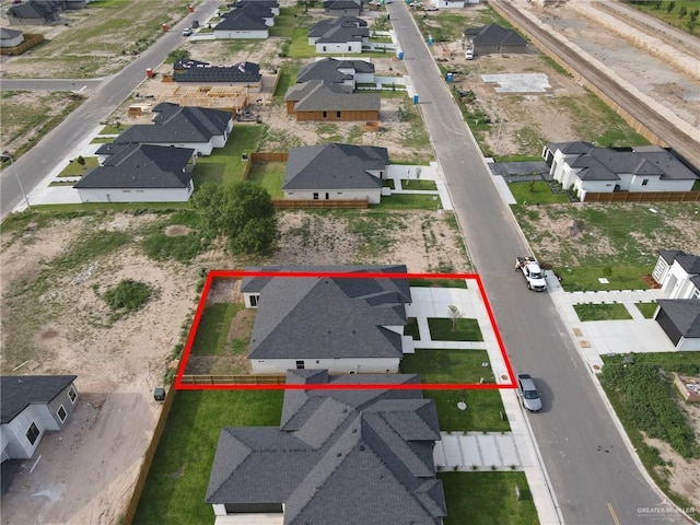 aerial perspective of suburban area featuring property boundaries highlighted