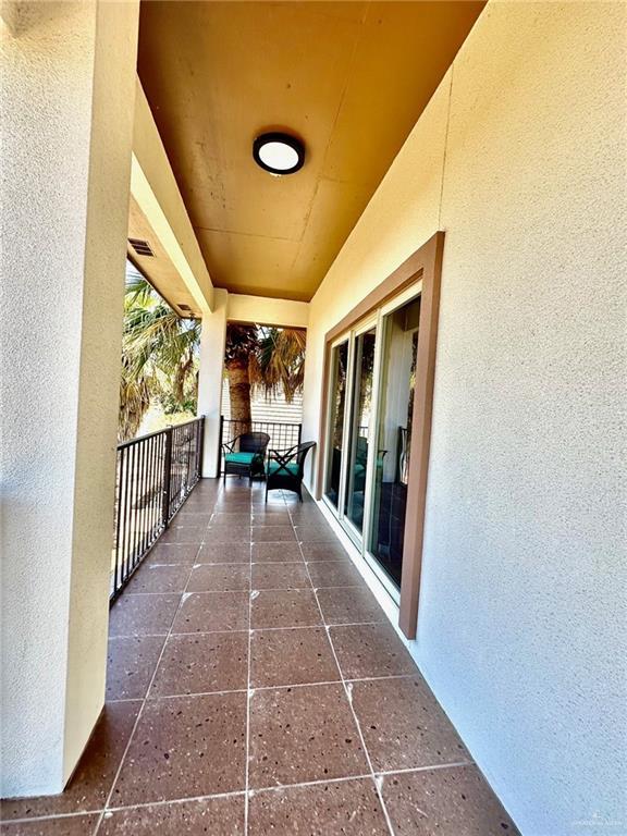 view of patio / terrace featuring visible vents and a balcony