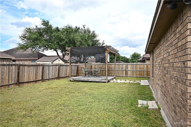 view of yard featuring a deck