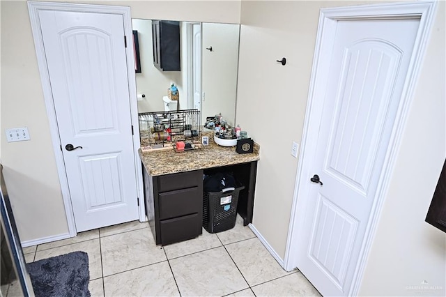 bathroom with tile patterned flooring