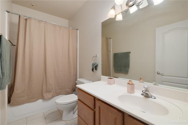 full bathroom featuring shower / tub combo, vanity, toilet, and tile patterned flooring