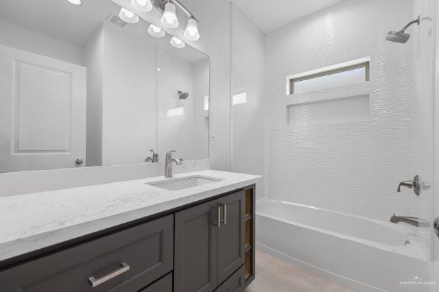 1212 Bridle Way, San Benito, TX 78586 - full bathroom featuring vanity and bathtub / shower combination