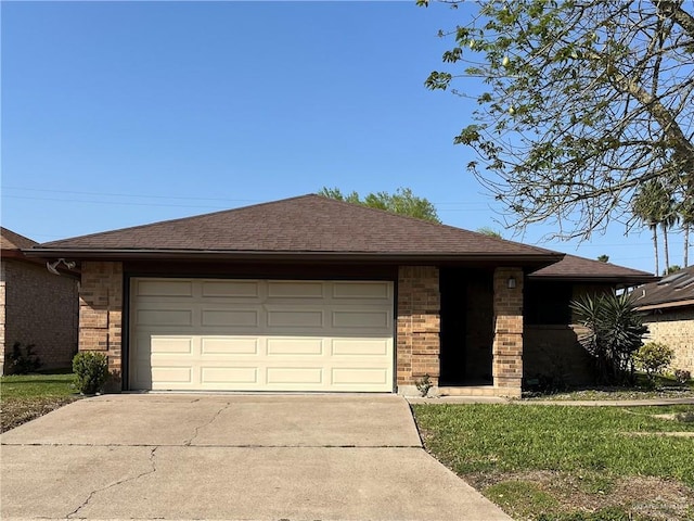 single story home with brick siding, concrete driveway, an attached garage, and a shingled roof