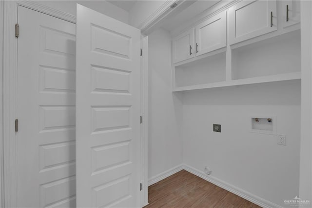 laundry room with washer hookup, light wood-type flooring, and electric dryer hookup