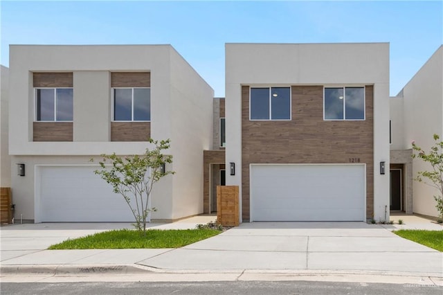 1218 N Lincoln Ave, San Juan, TX 78589 - modern home featuring a garage, concrete driveway, and stucco siding