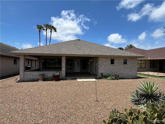 252 Rebecca Dr, Alamo, TX 78516 - view of front of property with brick siding and roof with shingles