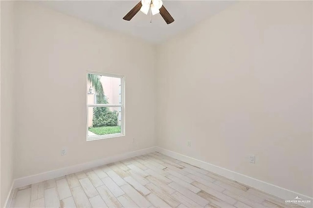 unfurnished room with ceiling fan and light wood-type flooring