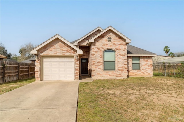 view of front of home featuring concrete driveway, brick siding, and fence