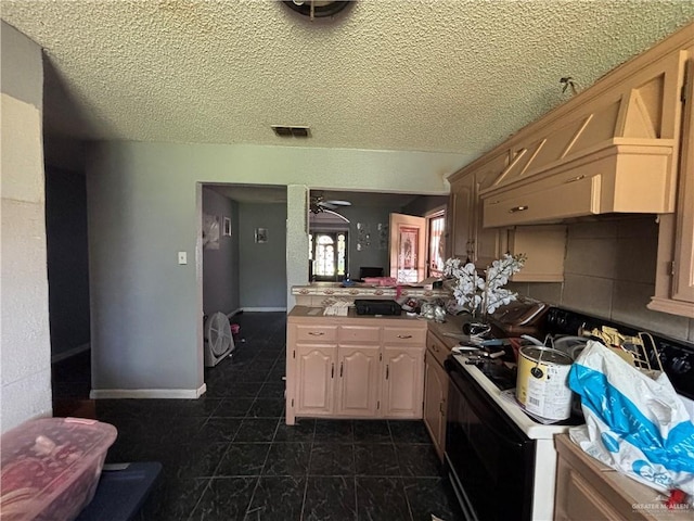 7221 S San Joaquin St, Pharr, TX 78577 - kitchen with range with electric cooktop, light countertops, a ceiling fan, and visible vents