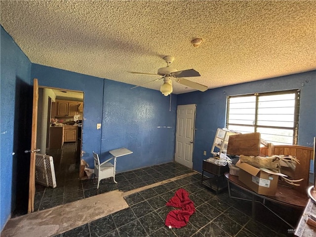 7221 S San Joaquin St, Pharr, TX 78577 - sitting room with tile patterned floors, a textured ceiling, and ceiling fan