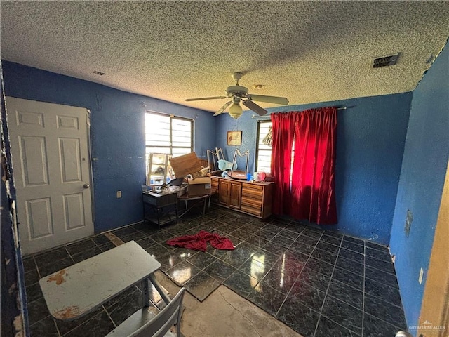 7221 S San Joaquin St, Pharr, TX 78577 - interior space featuring a textured wall, visible vents, a textured ceiling, and ceiling fan