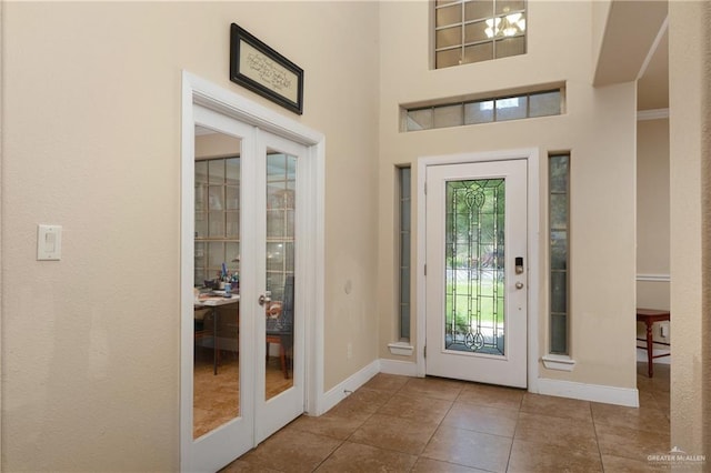 4230 Stillwater Cv, Edinburg, TX 78542 - entrance foyer with tile patterned floors, baseboards, and french doors