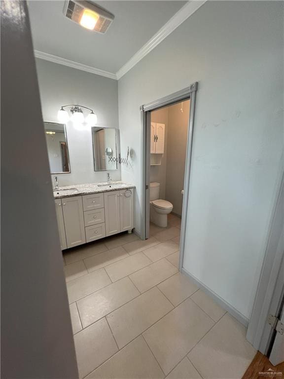 119 Cherokee Cir, Smithville, TX 78957 - full bath with double vanity, ornamental molding, toilet, and tile patterned flooring