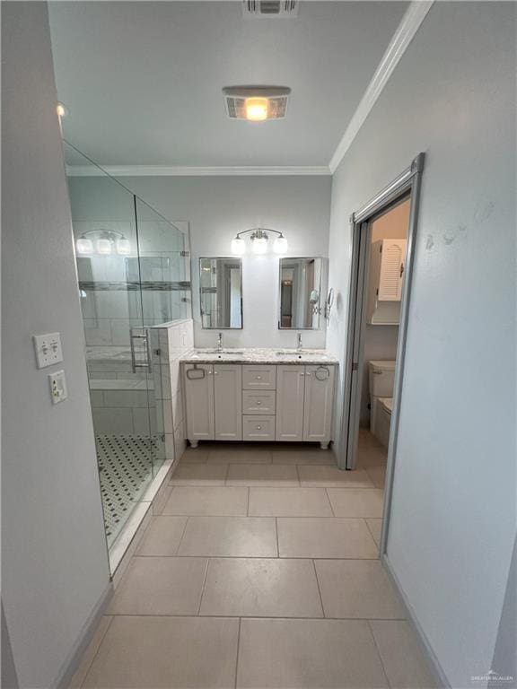 119 Cherokee Cir, Smithville, TX 78957 - bathroom with crown molding, double vanity, a stall shower, toilet, and tile patterned floors