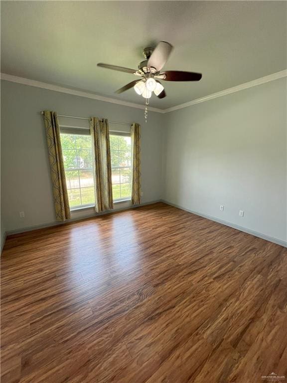 119 Cherokee Cir, Smithville, TX 78957 - empty room featuring wood finished floors, ornamental molding, a ceiling fan, and baseboards
