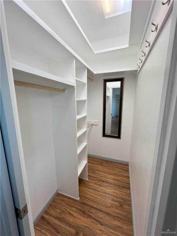 119 Cherokee Cir, Smithville, TX 78957 - spacious closet with dark wood-style floors