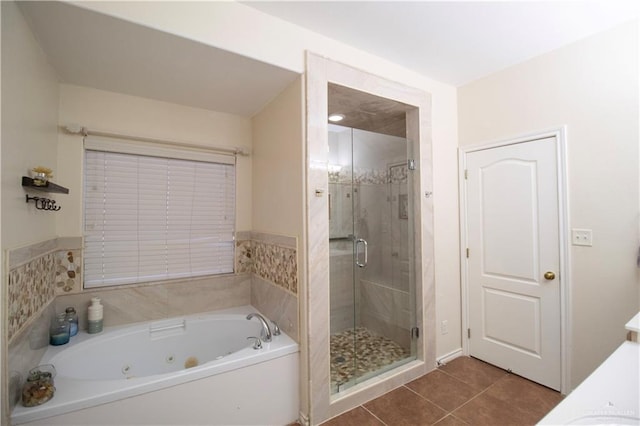 3109 Viola Dr, Mission, TX 78574 - bathroom with a whirlpool tub, a stall shower, tile patterned flooring, and vanity