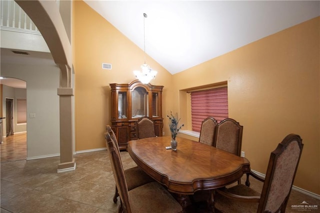 3109 Viola Dr, Mission, TX 78574 - dining room with arched walkways, high vaulted ceiling, baseboards, and tile patterned floors