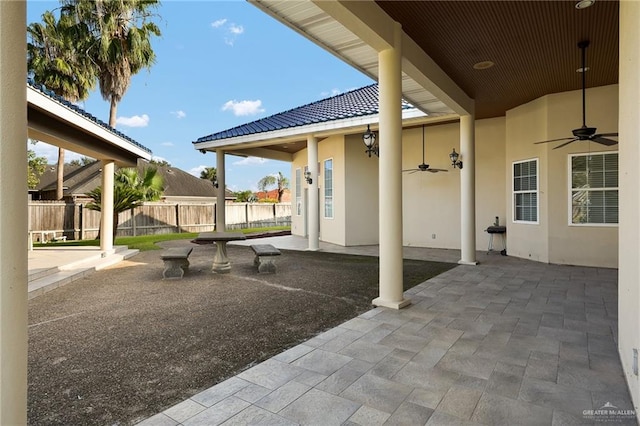 view of patio with ceiling fan