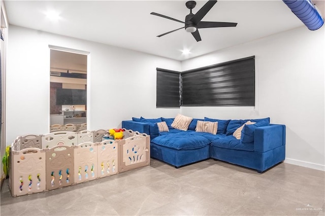 6706 N 11th Ln, Mcallen, TX 78504 - living area with ceiling fan and concrete flooring