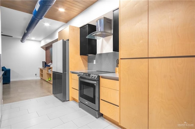 6706 N 11th Ln, Mcallen, TX 78504 - kitchen featuring stainless steel range with electric stovetop, freestanding refrigerator, wall chimney range hood, modern cabinets, and light brown cabinets