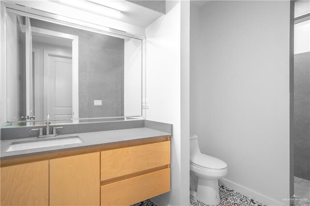 6706 N 11th Ln, Mcallen, TX 78504 - bathroom featuring vanity and tile patterned floors