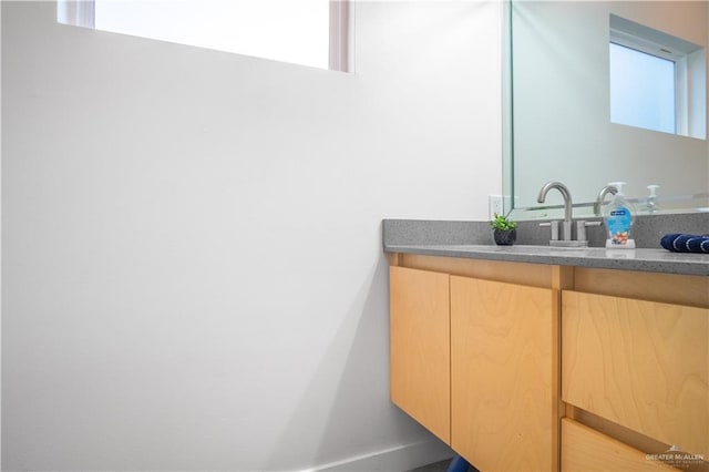 6706 N 11th Ln, Mcallen, TX 78504 - bathroom with vanity and baseboards