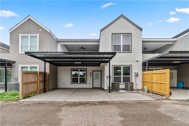 5516 N Crown Pt, Pharr, TX 78577 - rear view of property with stucco siding, fence, and cooling unit