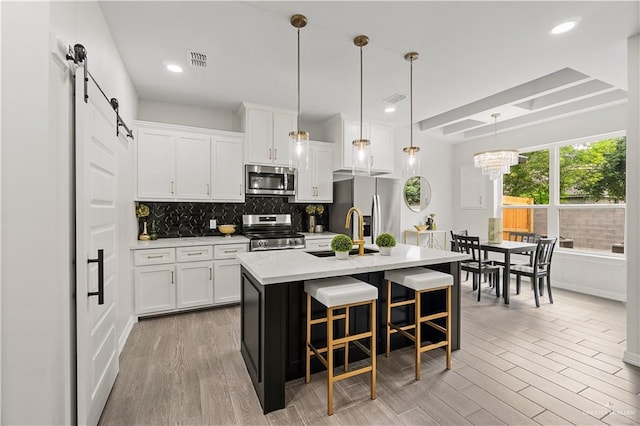 5516 N Crown Pt, Pharr, TX 78577 - kitchen featuring dishwasher, a sink, wood tiled floors, recessed lighting, and healthy amount of natural light