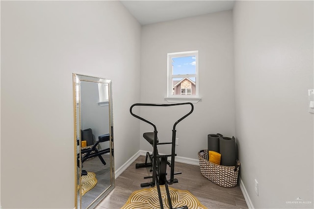 5516 N Crown Pt, Pharr, TX 78577 - bathroom featuring a marble finish shower, wood finish floors, toilet, vanity, and baseboards